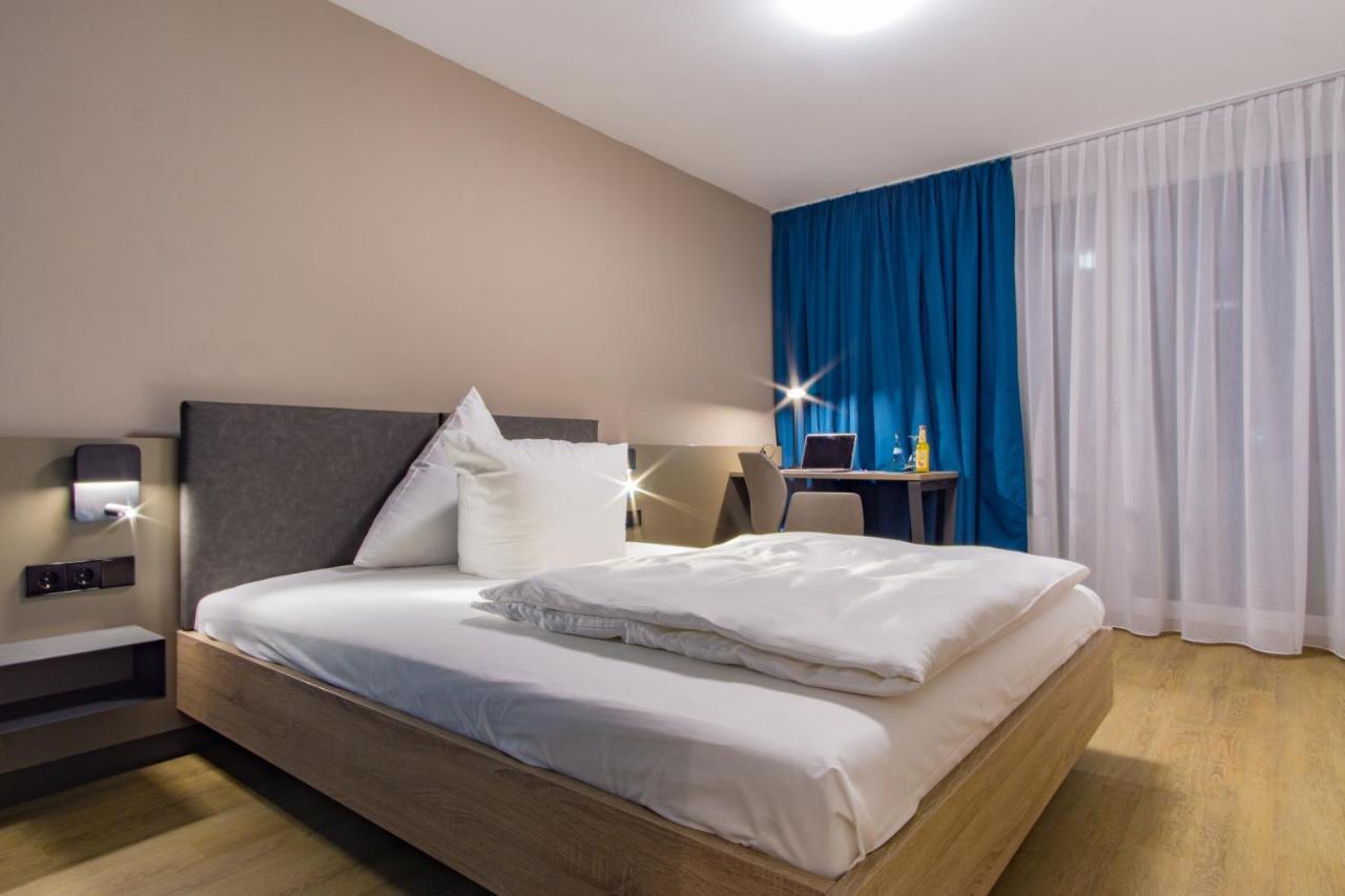 Hotel Berlin Зиндельфинген Экстерьер фото